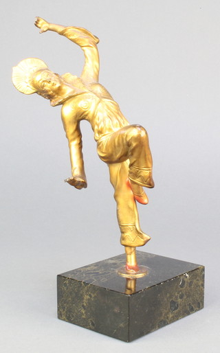 A bronze painted Art Deco figure of a dancing lady raised on a marble base 9 1/2" 
