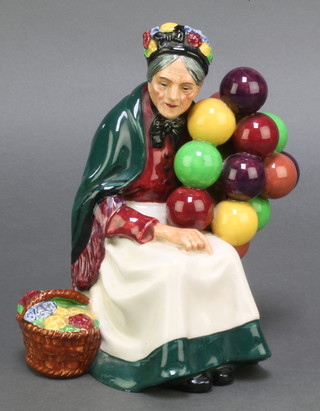 A Royal Doulton figure - The Old Balloon Seller HN1315 7 1/2" 