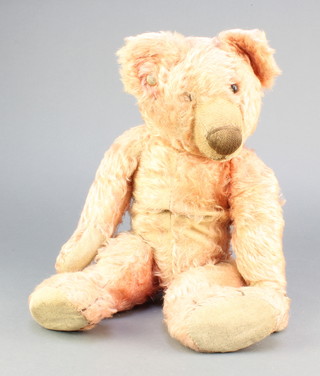A 1930's/40's pink mohair Chad Valley bear with articulated limbs and ear stud 17" 