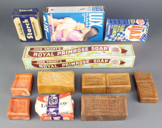 A shop display packet for John Knights Royal Primrose soap, a bar of Kudo soap, 4 bars of lifebuoy soap and other soaps