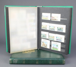 An album of Isle of Man mint stamps and a stock book of colonial stamps - Sri Lanka, Virgin Islands, Zanzibar, Malawi, Uganda and Zambia 