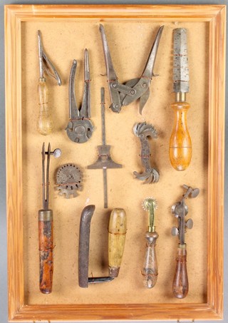 A collection of 19th Century and later tools including a saw setter, gauge etc 