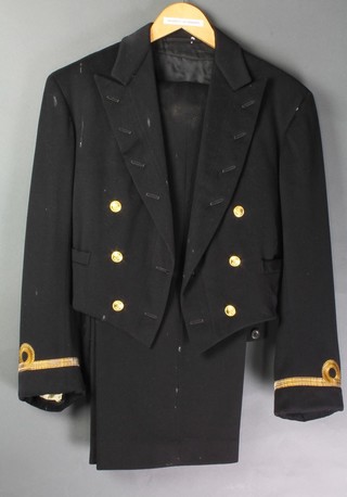 A Royal Naval Lieutenant Commander's tunic by Gieves together with a Sub Lieutenant Mess Kit jacket and trousers by Gieves  