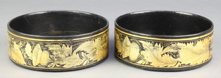 A pair of "Regency" lacquered bottle coasters, decorated thistles 5 1/2" 