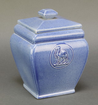 Ashtead Pottery, a blue glazed tea caddy and cover decorated with a figure of a camel 7" 
