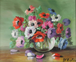 H F Borton, oil on canvas, signed, a study of poppies in a vase 10 1/2" x 11 1/2" 