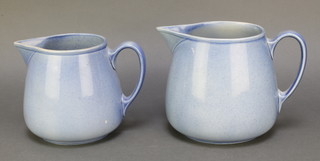 Ashtead Pottery, 2 blue glazed pottery jugs with scroll handles 6" and 6 1/2" 