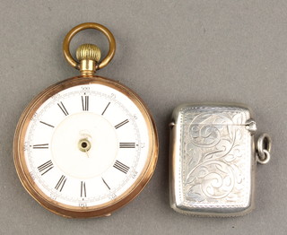 An Edwardian chased silver vesta Birmingham 1905 and a gentleman's gilt cased pocket watch 
