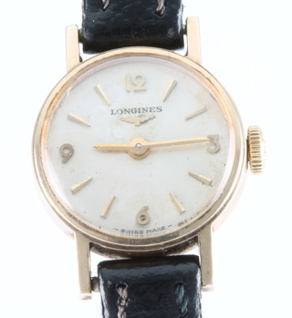 A lady's 9ct yellow gold Longines wristwatch on a leather strap 