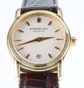 A lady's gold plated Raymond Weil Geneve calendar wristwatch on a leather strap 