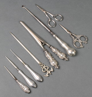 A pair of Edwardian silver glove stretchers and other mounted items 
