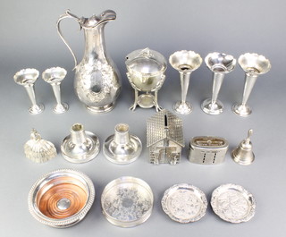 An Edwardian silver plated repousse ewer and minor plated items