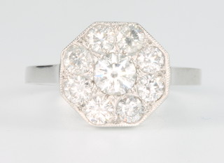 An 18ct white gold 9 stone diamond cluster ring, approx. 1.15ct, size M 1/2 