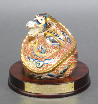 A Royal Crown Derby Japan pattern paperweight Dragon no.1, Dragon of Happiness 1194/1500 with gold stopper on a wooden socle base 4" 