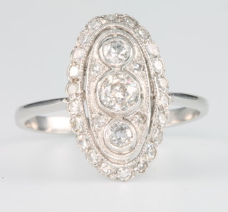 An 18ct white gold Art Deco style up finger diamond ring, approx. 0.75ct, size O 1/2 