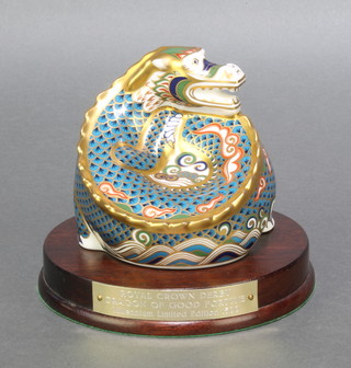 A Royal Crown Derby Japan pattern paperweight Dragon no.2 Dragon of Good Fortune 1194/1500 with gold stopper on a wooden socle base 4" 