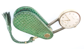 A lady's 14ct yellow gold watch the dial inscribed International Watch Co. Schaffhausen with seconds at 6 o'clock contained in a mock shagreen leather case with tassel 
