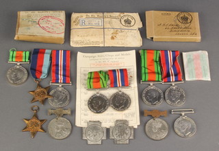 Three World War Two pairs - Defence British War medal, Defence British War medal, 1939-45 Star and British War medal, 3 Defence medals, 1 Italy Star, 4 Coronation medals and 2 posting boxes