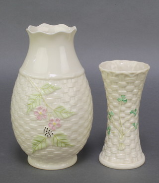 A Belleek basket weave vase decorated with flowers with brown mark 7 1/2 and a waisted basket weave clover vase with back mark 5 1/4" 
