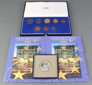 A South African cased proof coin set, 2 other proof coin sets and a South African commemorative crown 1937 