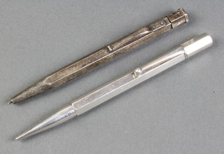 Two silver propelling pencils