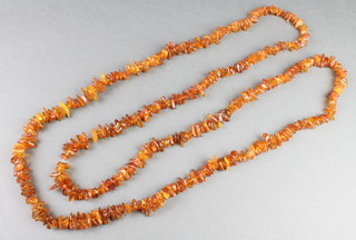 A natural amber bead necklace 66" 