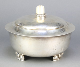 An art deco German silver bowl and lid with hammer pattern decoration and ivory finial stamped Aug.Stockem 4183 835 Aachen gross 488 grm