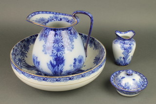 A Royal Doulton daisy pattern wash stand set comprising jug, bowl, toothbrush holder and soap dish 