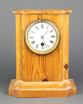 A French 19th Century 8 day timepiece with enamelled dial and Roman numerals (no pendulum) contained in a pine case
