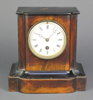 A French 19th Century 8 day timepiece with enamelled dial and Arabic numerals contained in a walnut ebonised finished case 