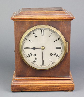 A striking bracket clock with 6" silvered dial and Roman numerals contained in a striking mahogany case, striking on a gong 