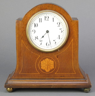 A French bedroom timepiece with enamelled dial and Arabic numerals contained in an arched inlaid mahogany case 8" 