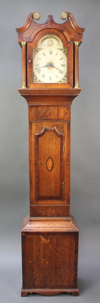 An 18th Century 30 hour striking Grandmother clock with 8" arch shaped painted dial marked John Wilson of Peterboro with brass pillar movement contained in an oak trunk with broken pediment, 60"h 