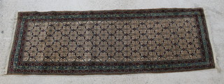An Afghan white and green ground runner 115" x 37" 