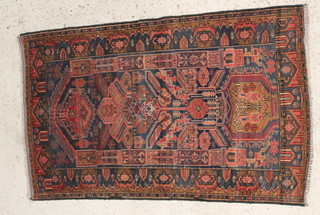 A blue and tan ground Tribal Balochi  rug 56" x 34" 
