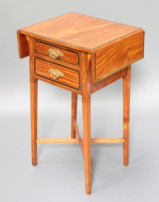 Garnett, an Edwardian inlaid and crossbanded satinwood drop flap occasional table, fitted a cupboard enclosed by a panelled door, raised on square tapering supports with X framed stretcher 30"h x 15"d x 18" closed x 27 1/2" when open 