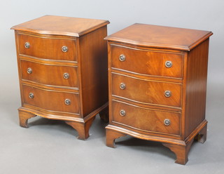 A pair of Georgian style mahogany chests of serpentine outline, fitted 3 long drawers and raised on bracket feet 27 1/2"h x 21"w x 16 1/2"d 