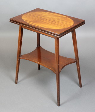 An Edwardian rectangular inlaid mahogany card table, the top inlaid an oval panel raised on square tapering supports and undertier 28"h x 22"w x 15"d 