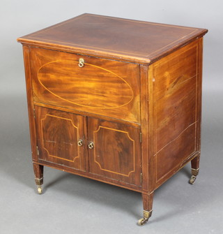 Edwards and Roberts, an Edwardian inlaid mahogany cabinet with fall front above double panelled doors, raised on square bracket feet, brass caps and casters  26"h x 26"w x 20" 