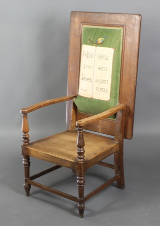 An oak metamorphic chair with hinged lid and solid seat, raised on turned and block supports,  with upholstered Berlin wool work seat back 50"h x 34"w x 23"d 
