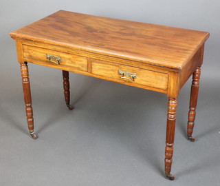 A 19th Century rectangular walnut architects table with ratcheted top fitted 2 drawers with brass drop handles, raised on turned and reeded supports 40"h x 42"w x 21"d 