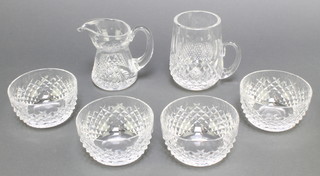 A Waterford Crystal Colleen pattern mug, a Waterford jug and 4 finger bowls 