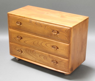A 1960's Ercol "Windsor" light elm chest of 3 long drawers 26"h x 36"w x 17"d  