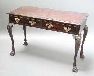 Butler of Dublin, a 19th Century Irish Chippendale style mahogany side table, fitted 2 long drawers, raised on carved cabriole supports 31"h x 48"w x 20"d ,Stamped to both drawers M Butler Dublin 