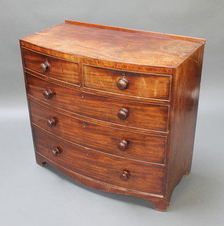 A 19th Century mahogany bow front chest of 2 short and 3 long drawers with tore handles, raised on bracket feet 38"h x 39"w x 20 1/2"d 