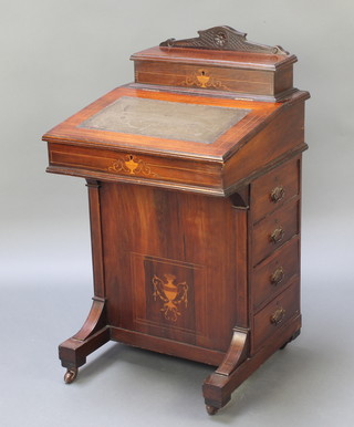 A Victorian inlaid rosewood Davenport desk with raised stationery box to the top, the pedestal fitted 4 long drawers, inlaid throughout, 36"h x 20 1/2"w x 20 1/2"d 