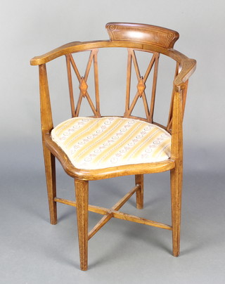 An Edwardian inlaid mahogany bar back corner chair on square supports with X framed stretcher  