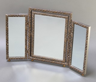 A 1930's triple bevelled plate dressing table mirror contained in a plaster frame 20"h x 29"w 