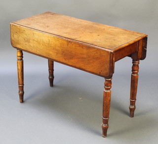 A Victorian bleached mahogany Pembroke table fitted a frieze drawer and raised on turned supports 25"h x 35"w x 15" when closed x 29" when extended 