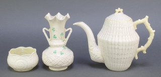 A Belleek shell pattern teapot with green mark 7 1/2", a ditto shell sugar bowl 3" and a clover leaf baluster vase 6" 